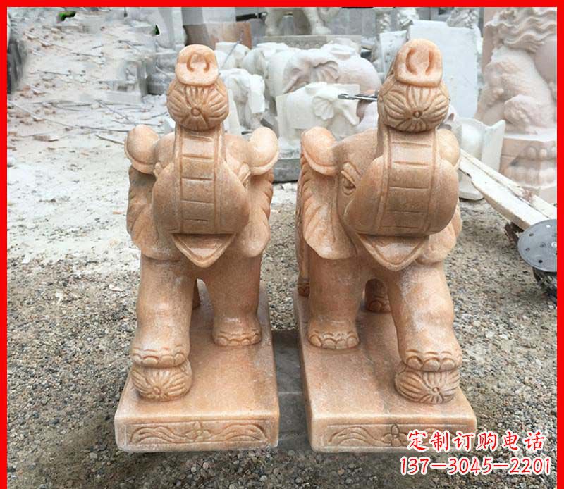 南京鼻卷绣球的小象石雕