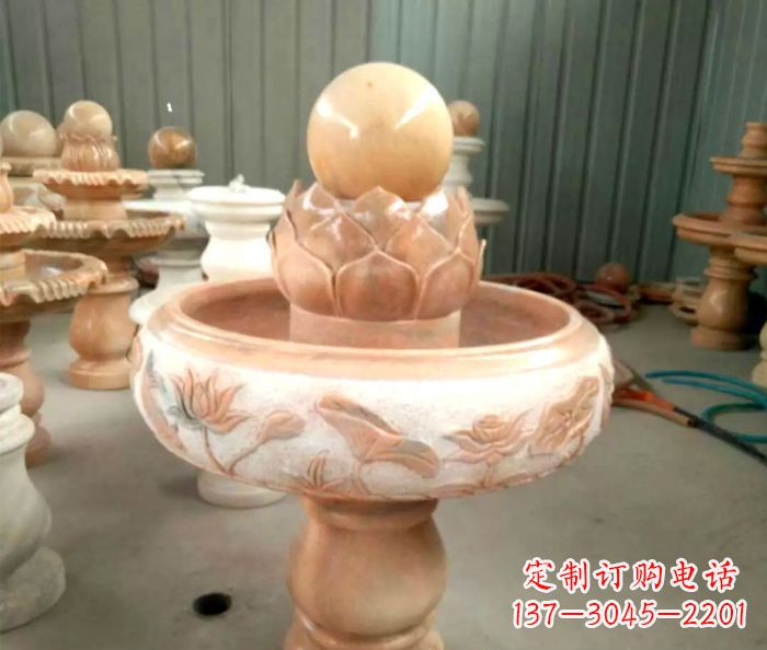 南京石来运转晚霞红风水球喷泉石雕