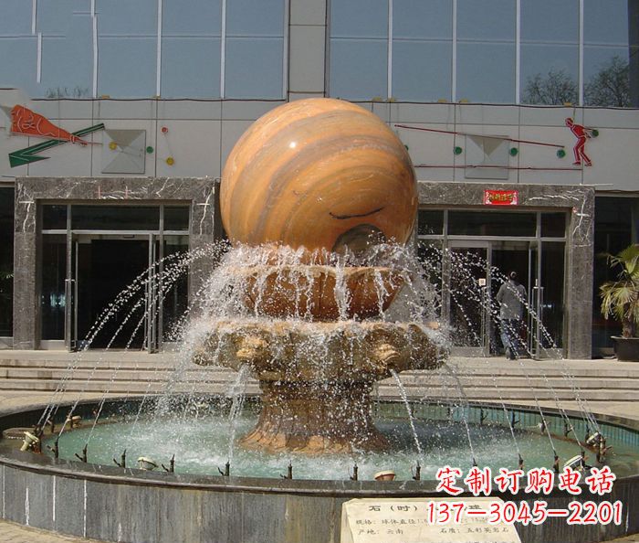 南京石来运转球晚霞红风水球石雕