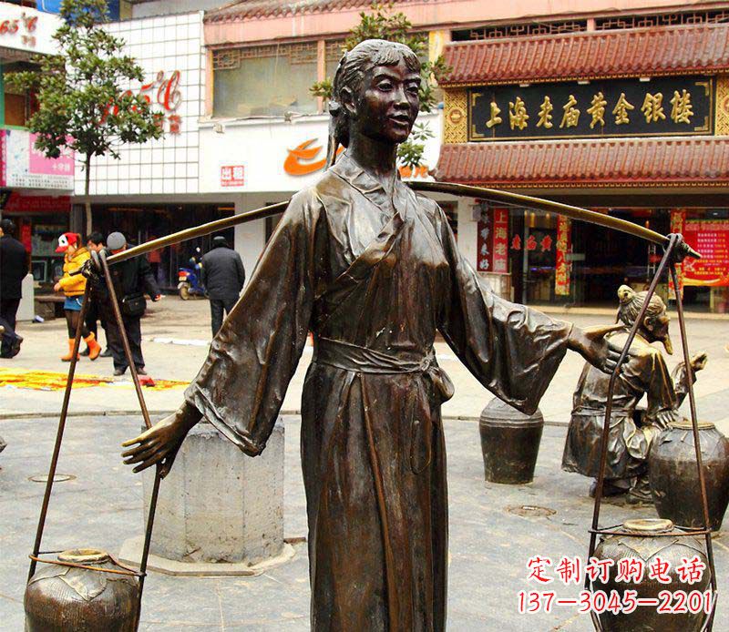南京挑着罐子的古代女人铜雕