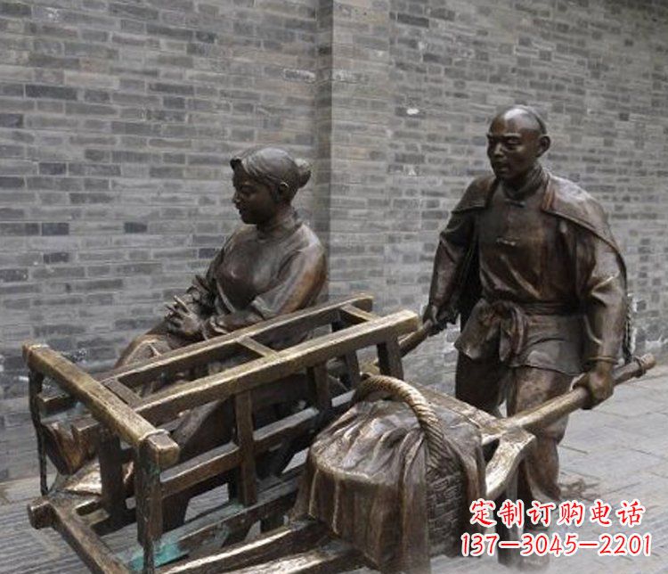 南京推独轮车的人物铜雕