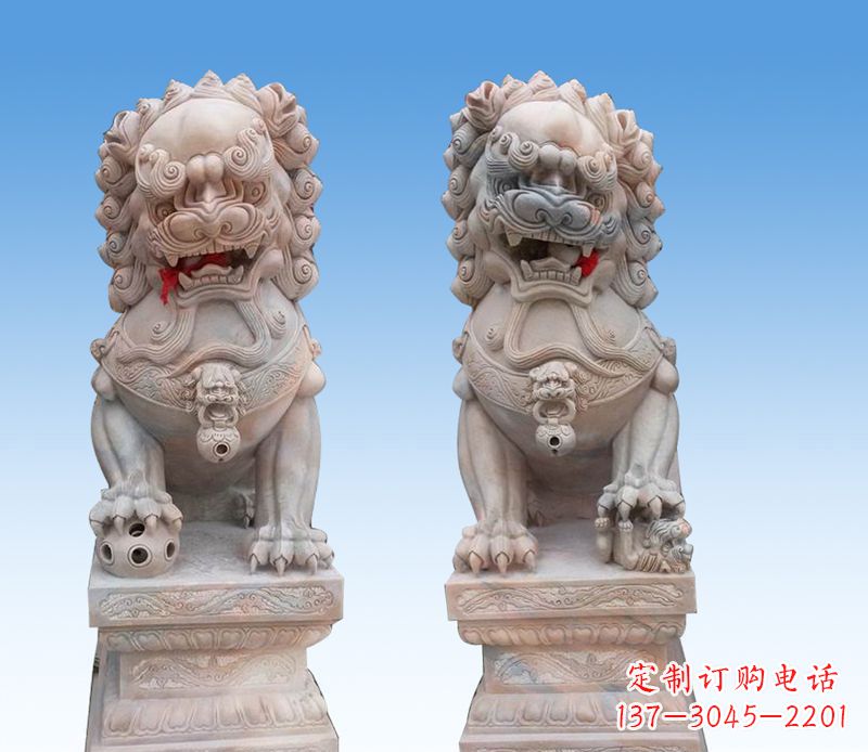 南京晚霞红踩球狮子石雕