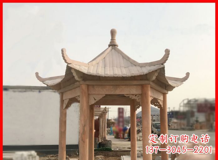 南京晚霞红公园六角石雕凉亭