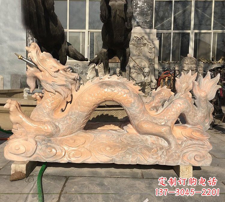 南京晚霞红石雕喷水龙