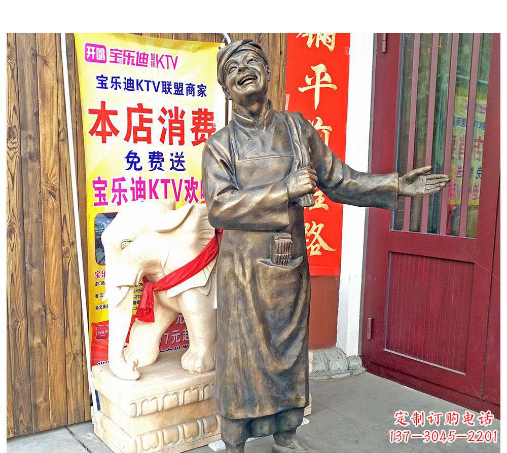 南京迎宾的店小二铜雕